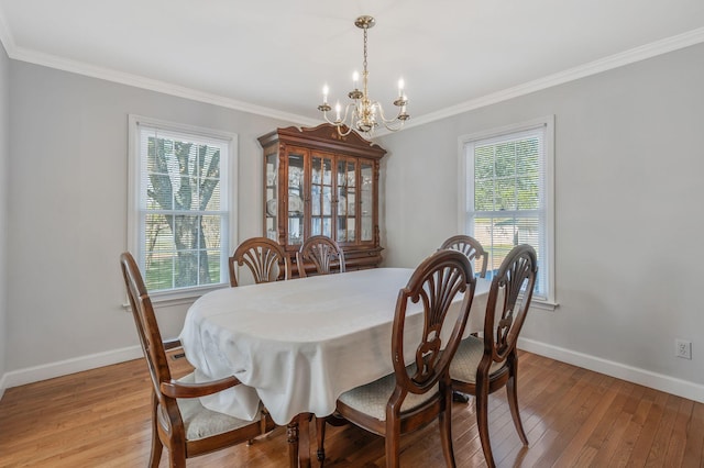 125 Sunnyside Ln, Columbia, TN 38401 - dining area featuring baseboards, ornamental molding, a chandelier, and light wood-type flooring