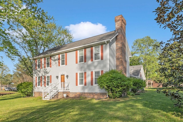 125 Sunnyside Ln, Columbia, TN 38401 - colonial home with a front lawn and a chimney