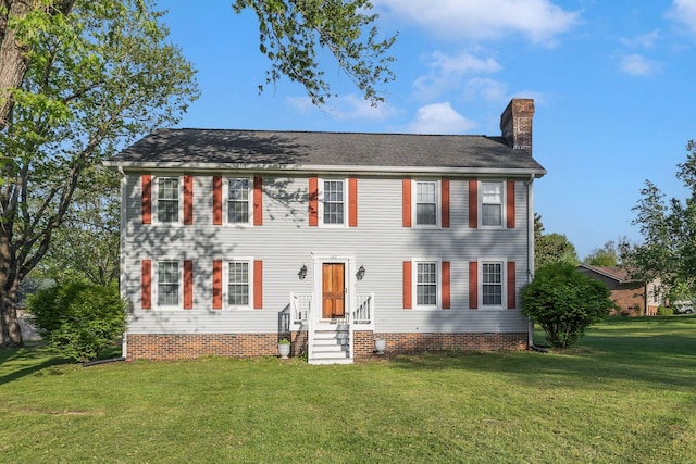 125 Sunnyside Ln, Columbia, TN 38401 - colonial home featuring a front lawn and a chimney