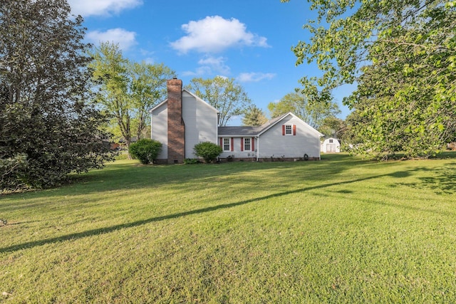 125 Sunnyside Ln, Columbia, TN 38401 - exterior space featuring a lawn and a chimney