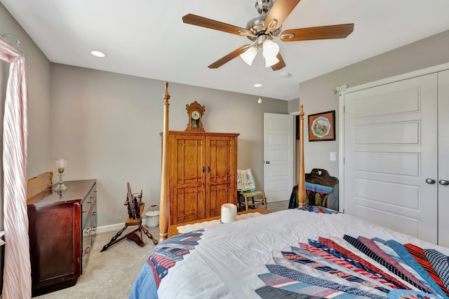 bedroom featuring recessed lighting, baseboards, a ceiling fan, and light carpet