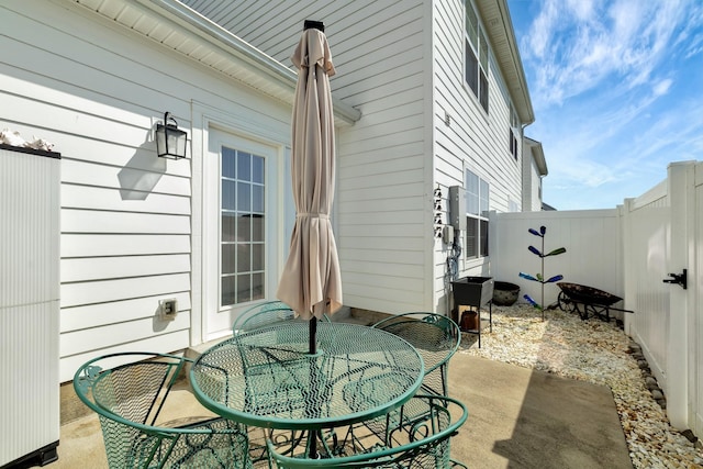 view of patio / terrace with a fenced backyard and outdoor dining space