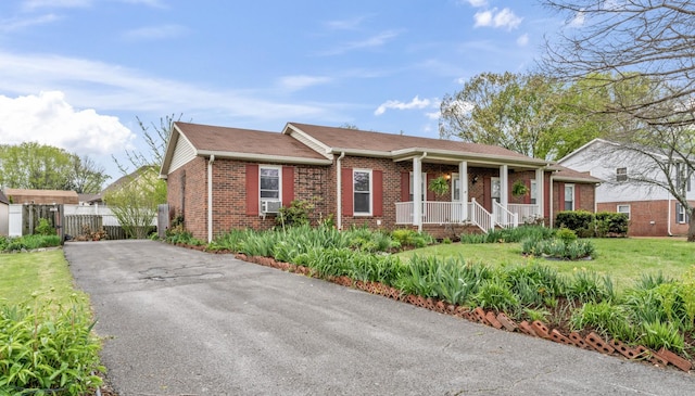 3720 Priest Lake Dr, Nashville, TN 37217 - single story home with a front lawn, brick siding, cooling unit, aphalt driveway, and fence