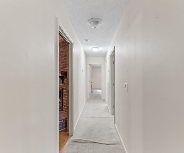 3720 Priest Lake Dr, Nashville, TN 37217 - corridor with baseboards and a textured ceiling