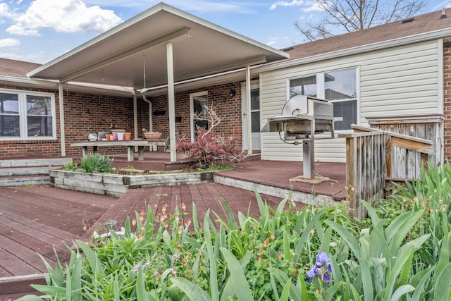 3720 Priest Lake Dr, Nashville, TN 37217 - rear view of house featuring a wooden deck and brick siding
