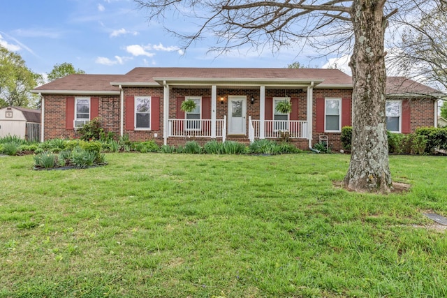3720 Priest Lake Dr, Nashville, TN 37217 - ranch-style home with a front yard, a porch, and brick siding