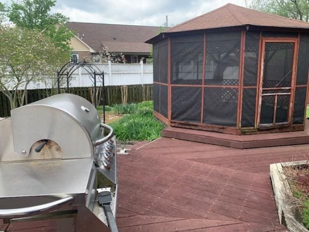 3720 Priest Lake Dr, Nashville, TN 37217 - view of patio / terrace with fence, area for grilling, a wooden deck, and a sunroom