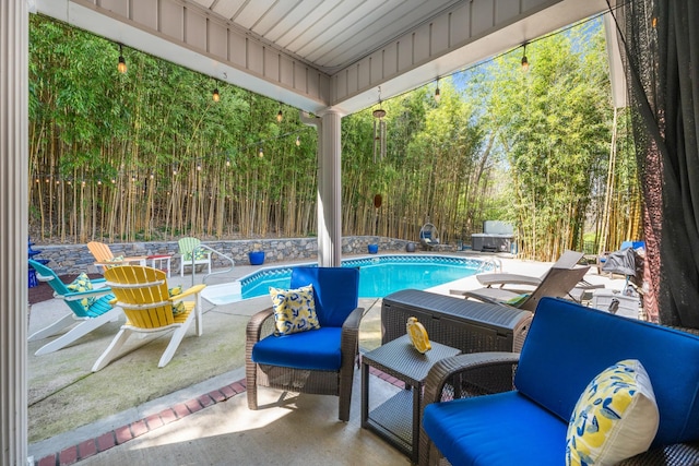 view of swimming pool with a fenced in pool, a patio area, and a fenced backyard