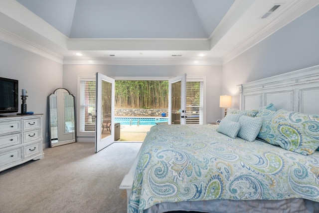 bedroom featuring french doors, access to exterior, multiple windows, and carpet floors