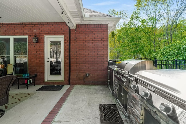 view of patio featuring a grill and area for grilling