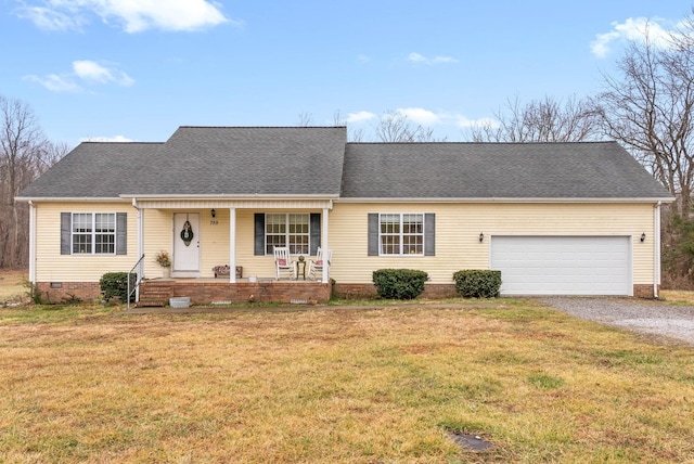 view of front of property featuring covered porch, a garage, a front lawn, driveway, and roof with shingles