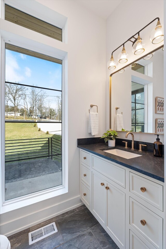 819 Davidson Dr, Nashville, TN 37205 - bathroom featuring vanity, baseboards, and visible vents