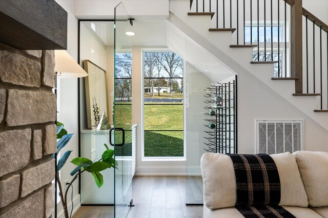 819 Davidson Dr, Nashville, TN 37205 - doorway to outside with stairway, visible vents, baseboards, and wood finished floors