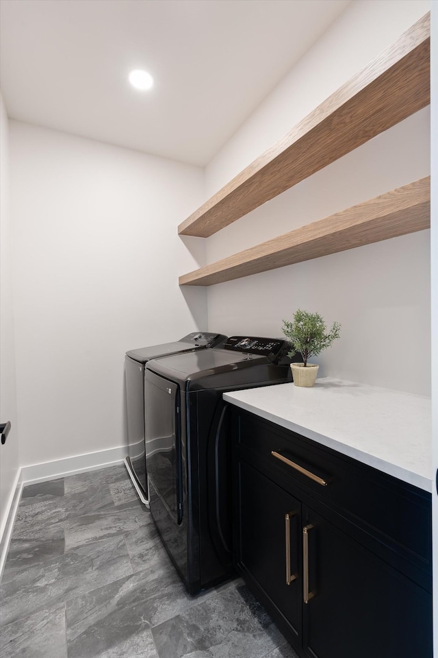 819 Davidson Dr, Nashville, TN 37205 - laundry area with cabinet space, baseboards, and separate washer and dryer