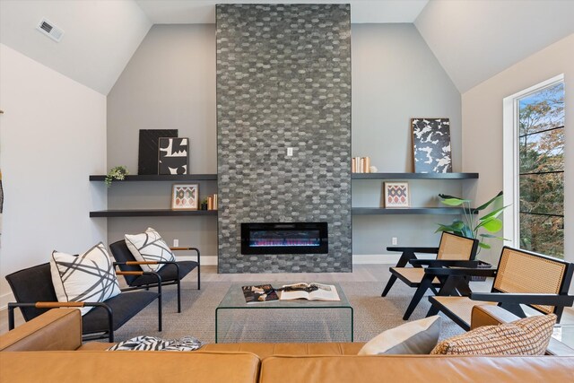 819 Davidson Dr, Nashville, TN 37205 - living room with a tile fireplace, high vaulted ceiling, baseboards, and visible vents