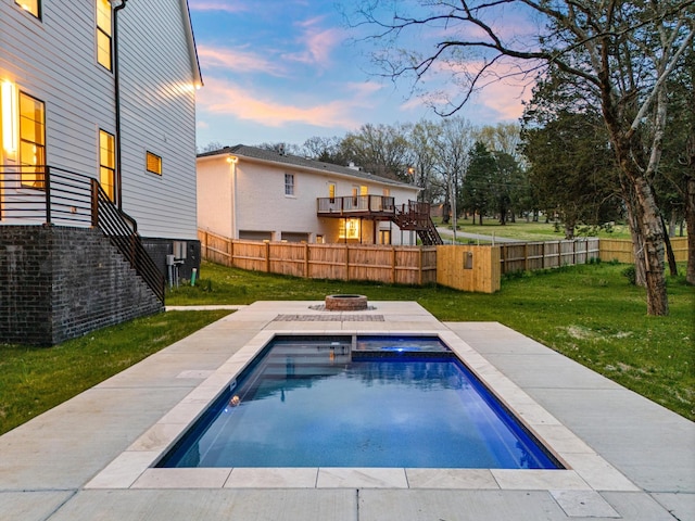 819 Davidson Dr, Nashville, TN 37205 - pool at dusk featuring a fire pit, a yard, a fenced backyard, stairway, and a fenced in pool