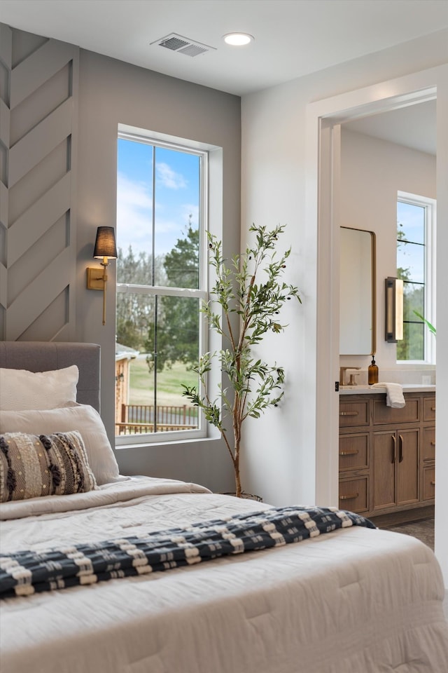 819 Davidson Dr, Nashville, TN 37205 - bedroom featuring ensuite bathroom, multiple windows, visible vents, and recessed lighting