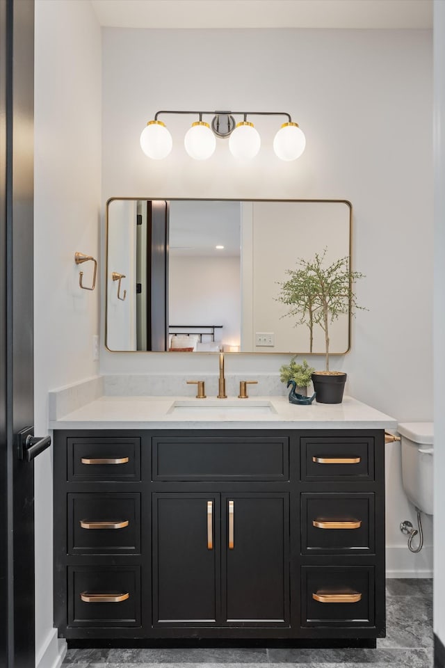 819 Davidson Dr, Nashville, TN 37205 - bathroom with toilet, vanity, and baseboards