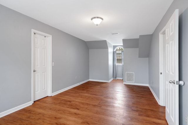 1719 Wynnewood Dr, Chapmansboro, TN 37035 - additional living space featuring wood finished floors, visible vents, and baseboards