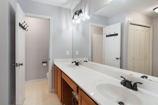 1719 Wynnewood Dr, Chapmansboro, TN 37035 - full bath featuring toilet, tile patterned floors, a sink, and baseboards