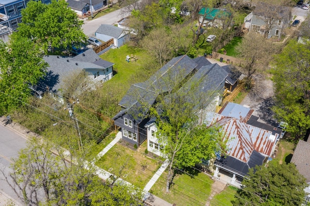 birds eye view of property with a residential view