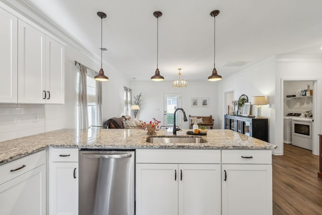 kitchen featuring washer / clothes dryer, crown molding, white cabinets, dishwasher, and a sink