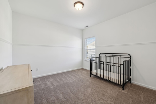 bedroom featuring visible vents, baseboards, and carpet floors