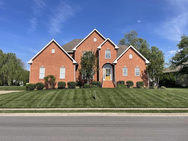 265 Gray Hawk Trl, Clarksville, TN 37043 - view of front facade featuring brick siding and a front lawn