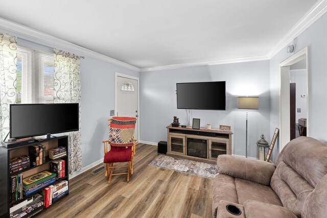 5007 Bonnalynn Dr, Hermitage, TN 37076 - living room with visible vents, ornamental molding, baseboards, and wood finished floors