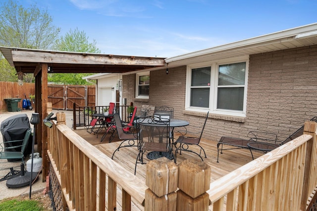 5007 Bonnalynn Dr, Hermitage, TN 37076 - deck with area for grilling, outdoor dining area, fence, and a gate
