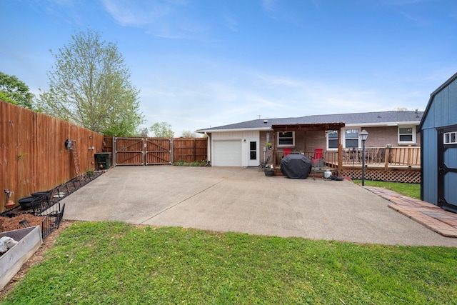 5007 Bonnalynn Dr, Hermitage, TN 37076 - exterior space featuring an attached garage, fence, a gate, and concrete driveway