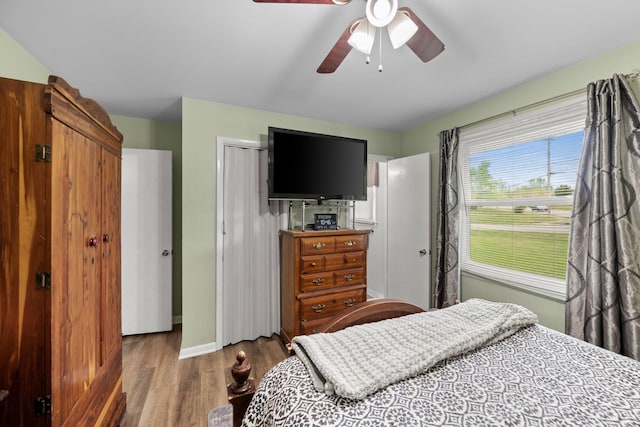 5007 Bonnalynn Dr, Hermitage, TN 37076 - bedroom with wood finished floors, a closet, a ceiling fan, and baseboards