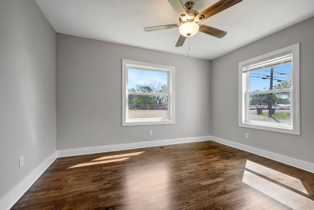 701 Santa Fe Pike, Columbia, TN 38401 - empty room with baseboards, plenty of natural light, and wood finished floors