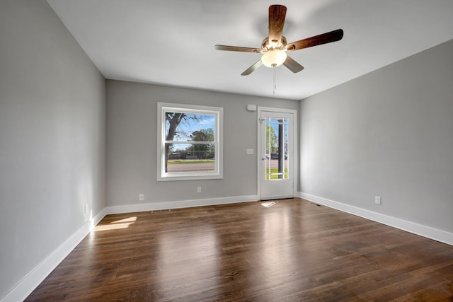 701 Santa Fe Pike, Columbia, TN 38401 - unfurnished room with baseboards, a ceiling fan, and wood finished floors