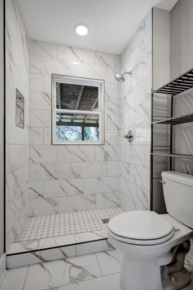 701 Santa Fe Pike, Columbia, TN 38401 - bathroom featuring toilet, marble finish floor, and a tile shower