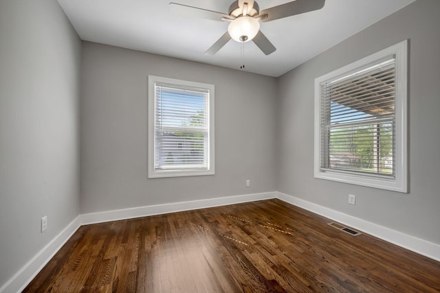 701 Santa Fe Pike, Columbia, TN 38401 - spare room with dark wood-style flooring, visible vents, baseboards, and ceiling fan