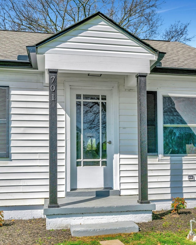 701 Santa Fe Pike, Columbia, TN 38401 - view of exterior entry featuring a shingled roof