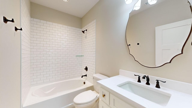 bathroom featuring toilet, vanity, and  shower combination