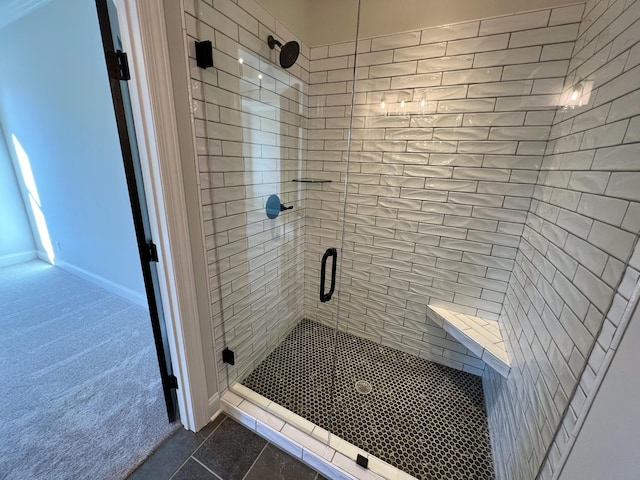 full bath with a shower stall