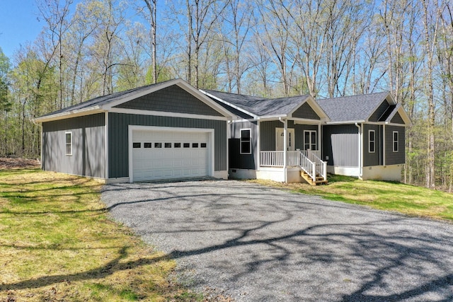 1018 Woodland Dr, New Johnsonville, TN 37134 - single story home featuring an attached garage, aphalt driveway, covered porch, and a front lawn