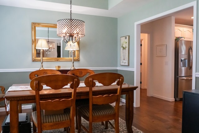 4769 Ellen Cir, Cookeville, TN 38501 - dining space featuring baseboards, an inviting chandelier, and wood finished floors