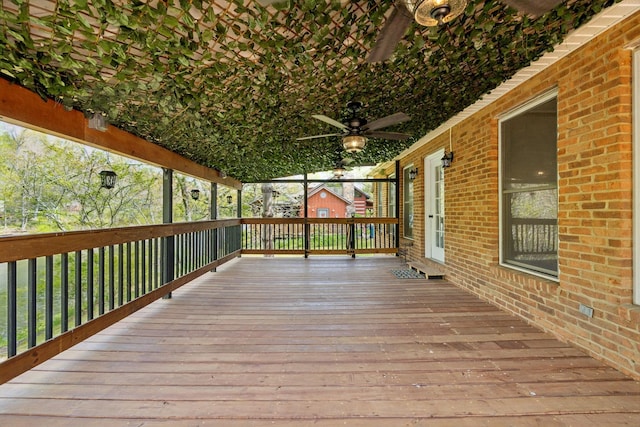 deck featuring a ceiling fan