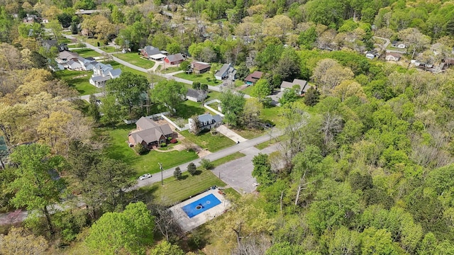 aerial view featuring a residential view and a forest view