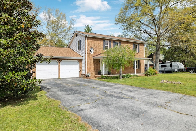view of front of house featuring brick siding, an attached garage, a front lawn, and aphalt driveway