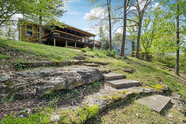 view of yard with a deck