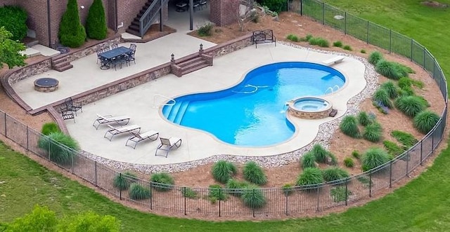 6516 Brandon Park Way, Franklin, TN 37064 - view of swimming pool featuring a pool with connected hot tub and a patio area