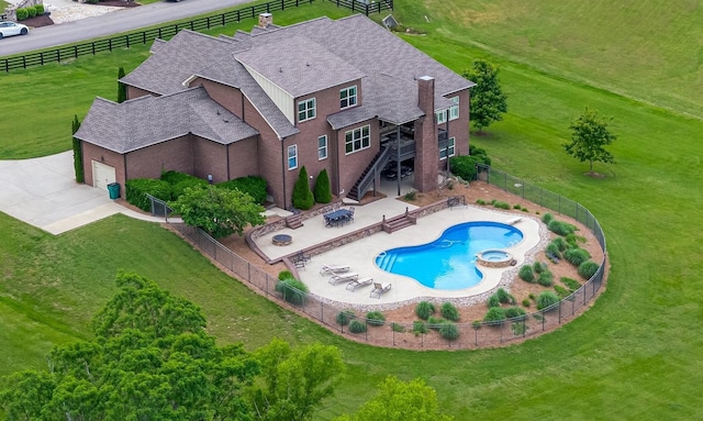 6516 Brandon Park Way, Franklin, TN 37064 - view of pool with stairs, a pool with connected hot tub, and a patio