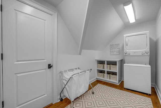 328 White Swans Xing, Brentwood, TN 37027 - interior space with baseboards, wood finished floors, stacked washing maching and dryer, and laundry area