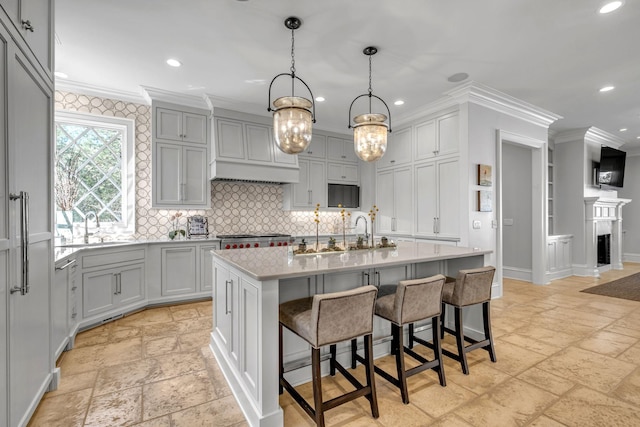 328 White Swans Xing, Brentwood, TN 37027 - kitchen featuring recessed lighting, stone tile floors, ornamental molding, decorative backsplash, and gray cabinetry