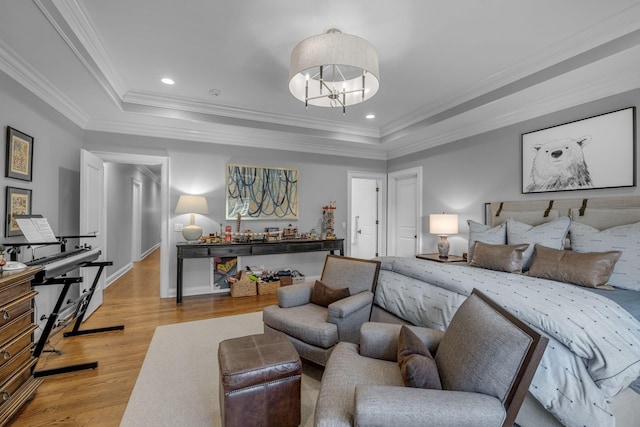 328 White Swans Xing, Brentwood, TN 37027 - bedroom featuring baseboards, crown molding, a tray ceiling, and light wood-style floors